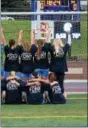  ??  ?? The Daniel Boone girls soccer team comes together for a photo wearing Sept. 11 tribute t-shirts ahead of Monday’s game at Exeter. The Sept. 11 tribute night has become an annual Blazers’ tradition started by the Carroll sisters - alums Brittany, Taylor...