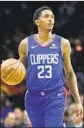  ?? Matt Slocum Associated Press ?? LOU WILLIAMS is averaging 18.6 points for the Clippers this season.