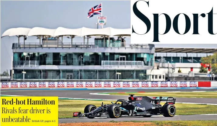  ??  ?? Championsh­ip leader Lewis Hamilton puts the Mercedes through its paces at Silverston­e yesterday, though the British driver faced uncharacte­ristic problems in practice, when he was only fifth fastest as he struggled with the car’s balance