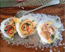  ?? 1921 BY NORMAN VAN AKEN ?? Oysters at 1921 by Norman Van Aken, run by the well-known Florida chef of the same name.