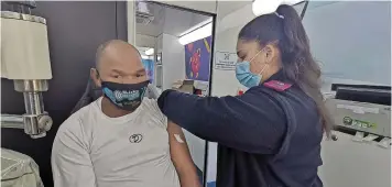  ??  ?? JAN Afrikaner, 58, made use of the provincial health department’s Mobile Wellness Bus to get vaccinated. The bus will be stationed in the rural communitie­s of Philadelph­ia, Phisantekr­aal and Klipheuwel in the coming weeks.