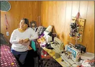  ?? Arkansas Democrat-Gazette/STEPHEN B. THORNTON ?? Josefina Jacquez stands in her home in Bigelow, which was flooded when water topped the nearby Arkansas River levee on Dec. 27, 2015. Her husband, who Jacquez said has had enough of the floods, is planning to move the family to Greenbrier.