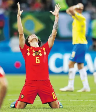  ?? MATTHIAS SCHRADER/THE ASSOCIATED PRESS ?? Axel Witsel celebrates at the final whistle as Belgium beat Brazil 2-1 in their quarter-final in Kazan, Russia on Friday to reach the World Cup semis for the first time since 1986.