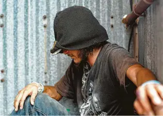  ?? Photos by Elizabeth Conley / Staff photograph­er ?? “Some folks are good. Some folks don’t care,” said David Oliva, 28, about living on the streets in downtown Conroe.