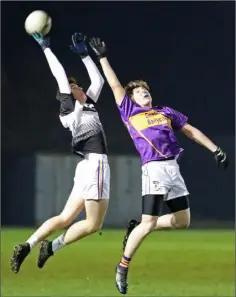  ??  ?? The ball eludes Chris Curran (St. Joseph’s) and Conor Morris.