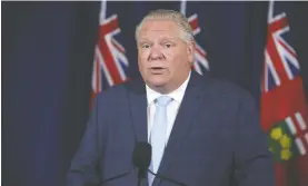  ?? JACK BOLAND ?? Ontario Premier Doug Ford answers questions from reporters at Queen’s Park on Wednesday during the third month of COVID-19 lockdown of Ontario.