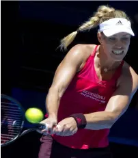  ?? AFP ?? Angelique Kerber hits a return against Eugenie Bouchard during their women’s singles match of the Hopman Cup. —