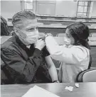  ?? Courtesy Archdioces­e of San Antonio ?? San Antonio Archbishop Gustavo García-siller receives his first dose of the Moderna vaccine in January. Faith leaders can play a huge part in helping people overcome vaccine hesitancy.