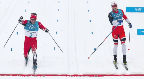  ?? JEAN LEVAC ?? Alex Harvey of Canada, left, edges out Martin Johnsrud Sundby of Norway to take fourth place in the men’s 50-kilometre cross-country skiing event on the eve of the closing ceremony to Pyeongchan­g 2018. With his strong finish, Harvey asserted to the...