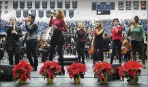  ??  ?? Members of Fairmont High School’s a capella group Eleventh Hour perform at Trent Arena. The facility hosts events such as the National A Capella Festival and Premier Health Flyin’ to the Hoop.