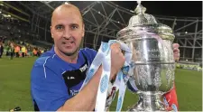  ??  ?? Paul Cook with the FAI Cup.