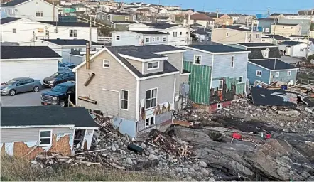  ?? — amy INGRAM/AFP ?? damage caused by Hurricane Fiona in channel-port aux basques, nova Scotia, canada. Parts of eastern canada suffered immense devastatio­n after powerful storm Fiona swept houses into the sea and caused major power outages on Sept 24.