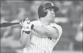  ?? MIKE STOBE/GETTY ?? The Yankees’ Kendrys Morales hits a home run in the second inning against the Rays on Friday night.