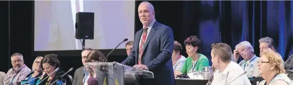 ?? FRANCIS GEORGIAN ?? B.C. NDP Leader John Horgan speaks to delegates at the B.C. Government and Service Employees’ Union convention in Vancouver on Friday.