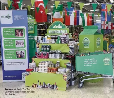  ??  ?? Tonnes of help The Tesco Dalmarnock collection for local foodbanks