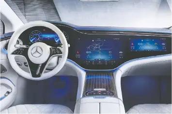  ??  ?? The interior of the Mercedes EQS has screens running the width of the dashboard.