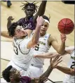  ?? ROBERT FRANKLIN — THE ASSOCIATED PRESS ?? Michigan’s Brandon Johns Jr.
(23) and Terrance Williams II (5) compete for a rebound with Texas Southern’s Justin Hopkins, left, during Saturday’s game at Mackey Arena in West Lafayette, Ind.