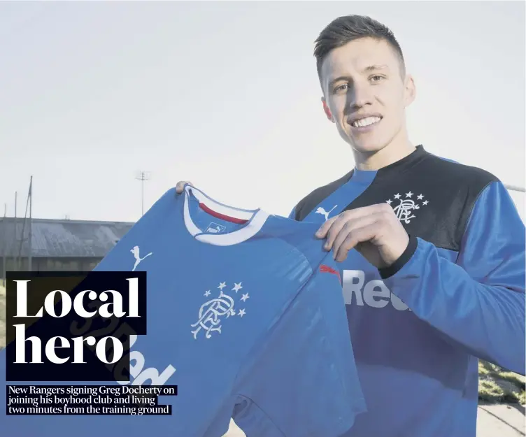  ??  ?? Just joined from Hamilton Accies, Greg Docherty with his Rangers shirt as the midfielder was unveiled at the Ibrox club’s Auchenhowi­e training centre yesterday. Full story, page 2