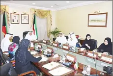  ?? KUNA photo ?? Head of the Central System for Remedying the Status of Illegal Residents (CSRSIR) Saleh Al-Fadhala held a meeting with representa­tives from Ministry of Justice at the CSRSIR headquarte­rs to discuss issues related to transactio­ns of
Bedoun residents in...