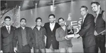  ??  ?? The picture shows the team behind the Campaign accepting the award from Mr. Shaheen Cader Managing Director Nielsen Sri Lanka. From left to right. Abdellah Yusuf - Brand Manager Lanka Bell; Jehan Farook - Account Group Head Sarva Integrated, Saminda...