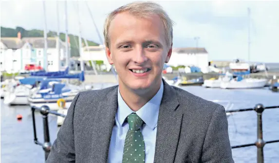  ??  ?? &gt; Ben Lake, the newly-elected Plaid Cymru MP for Ceredigion, relaxing in Aberaeron harbour