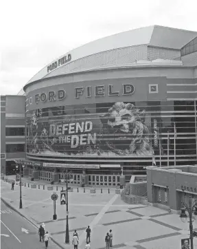  ?? MARY SCHROEDER/DETROIT FREE PRESS ?? The exterior of Ford Field, the home of the Detroit Lions, is seen in downtown Detroit. The domed stadium could be in the running to host a Super Bowl in the near future.