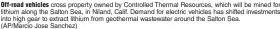  ?? (AP/Marcio Jose Sanchez) ?? Off-road vehicles cross property owned by Controlled Thermal Resources, which will be mined for lithium along the Salton Sea, in Niland, Calif. Demand for electric vehicles has shifted investment­s into high gear to extract lithium from geothermal wastewater around the Salton Sea.