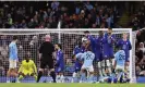  ?? Photograph: Robbie Jay Barratt/AMA/Getty Images ?? Riyad Mahrez finds a gap in the Chelsea wall to score from a free-kick.