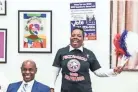  ?? BRAD ?? United Education Associatio­n union leader Tikeila Rucker, right, and Shelby County Schools Superinten­dent Dorsey Hopson get excited at the start of a rally held by the United Education Associatio­n at the Shelby County Schools headquarte­rs on Tuesday. VEST / THE COMMERCIAL APPEAL