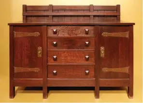  ??  ?? This Gustav Stickley credenza (in the collection of the Art Institute of Chicago) creates a simple rhythm by varying the width of the cabinets.