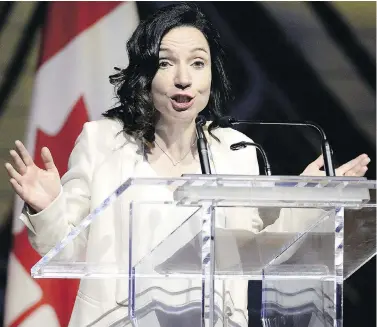  ?? JUSTIN TANG / THE CANADIAN PRESS ?? Bloc Québécois Leader Martine Ouellet jokes during her speech at the Parliament­ary Press Gallery dinner in Gatineau, Que., last month. BQ members voted on the weekend against Ouellet’s leadership by a two-to-one margin.