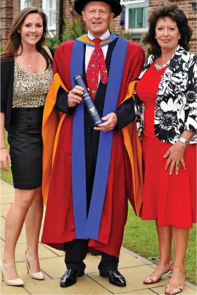  ??  ?? Proud: Geoff Boycott receives an honorary degree with daughter Emma and wife Rachael