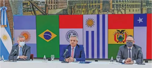  ?? AFP/ ESTEBAN COLLAZO ?? President Alberto Fernandez (C), Foreign Minister Felipe Sola (L) and Productive Developmen­t Minister Matias Kulfas attending a Mercosur Summit.