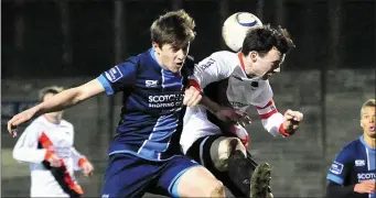  ?? Pic: Larry McQuillan ?? United’s Jake Hyland goes head-to-head with Drogheda Town’s Ciaran Cluskey Kelly.