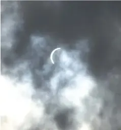  ?? (Pine Bluff Commercial/I.C. Murrell) ?? A near-total eclipse of the sun above Watson Chapel High School is pictured.