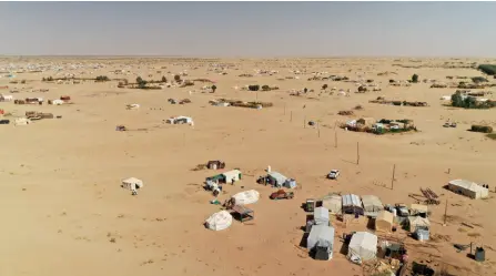  ?? ?? An aerial view shows Yemen’s al-Sumya camp for internally displaced persons east of Marib city, the government’s last northern stronghold. — AFP photos