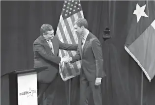  ?? Nathan Hunsinger/The Dallas Morning News via AP, Pool ?? ■ Republican U.S. Sen. Ted Cruz, left, and Democratic U.S. Rep. Beto O’Rourke, right, shake hands Friday in Dallas following their first debate for the Texas U.S. Senate seat held by Cruz.