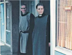  ??  ?? Augustine Hoey, in foreground, and Alexander Cox at Emmaus, the house of prayer Hoey set up in 1973 in a rough housing estate in Manchester; far right: Hoey at the Slipper Chapel at Walsingham (2015)