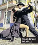  ??  ?? Tango dancers in La Boca