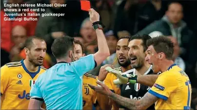  ??  ?? English referee Michael Oliver shows a red card to Juventus’s Italian goalkeeper Gianluigi Buffon