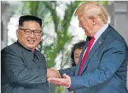  ?? Picture: KEVIN LIM/THE STRAITS TIMES VIA REUTERS ?? FRIENDS SUDDENLY: North Korean leader Kim Jong-Un, left, meets US President Donald Trump at their summit on Sentosa island in Singapore
