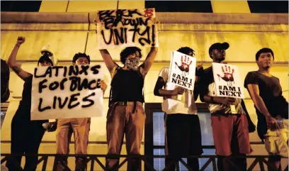  ?? PICTURE: REUTERS ?? Marchers protest against he police shooting of Keith Scott in Charlotte, North Carolina.