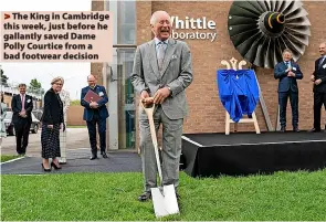  ?? ?? > The King in Cambridge this week, just before he gallantly saved Dame Polly Courtice from a bad footwear decision