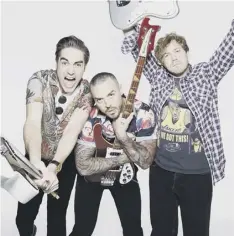  ??  ?? 0 Charlie Simpson, Matt Willis and James Bourne of Busted
