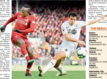  ?? — AFP ?? Sadio Mane (left) of Liverpool in action against Jack Cork of Burnley in their English Premier League match at Anfield in Liverpool on Sunday. The hosts won 4-2.