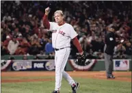  ?? Winslow Townson / Associated Press ?? Red Sox pitcher Curt Schilling tips his hat as he walks off the field after being taken out of the game in Game 2 of the 2007 World Series against the Rockies at Fenway Park in Boston.