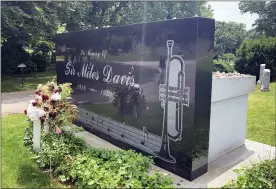  ?? (AP PHOTO/JULIA RUBIN) ?? The grave of jazz great Miles Davis appears at Woodlawn Cemetery in the Bronx borough of New York on June 27, 2021. The corner is a stop on a trolley tour of “jazz and vaudeville greats” offered by the cemetery.