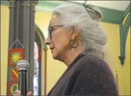  ??  ?? Lydia Brewster, assistant director for community services at St. Vincent De Paul, speaks to the crowd during the Middlesex County Homeless Persons’ Memorial Service last week at Church of the Holy Trinity on Main Street in Middletown. Cassandra Day /...