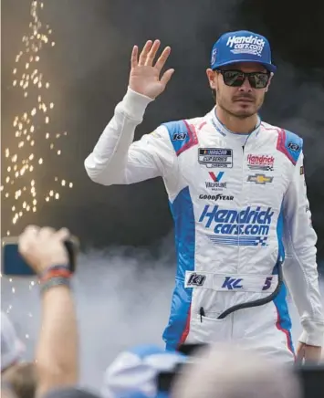  ?? STEVE HELBER/AP ?? Kyle Larson says he’s looking forward to racing 2007 F1 champion Kimi Raikkonen on Sunday at Watkins Glen.