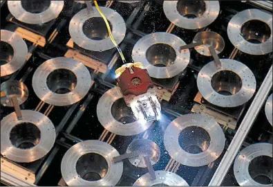  ?? AP/SHUJI KAJIYAMA ?? A newly developed robot for underwater investigat­ion of a damaged reactor at the Fukushima plant moves through the water at a Toshiba Corp. test facility in Yokosuka near Tokyo last week.